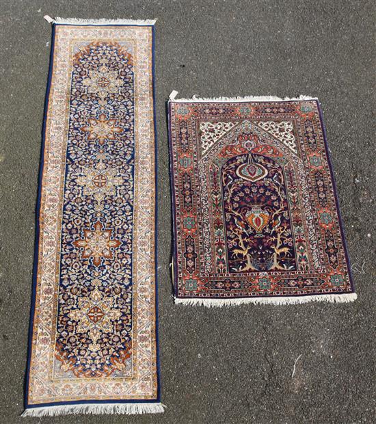 A Persian runner and rug, 8ft 10in by 4ft 3in and 4ft 8in by 3ft 3in.